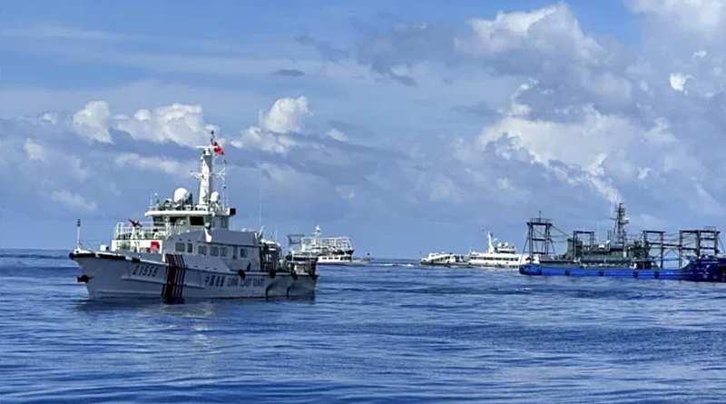 Dozens of Chinese ships chase Philippine vessels as US renews warning it will defend its treaty ally
